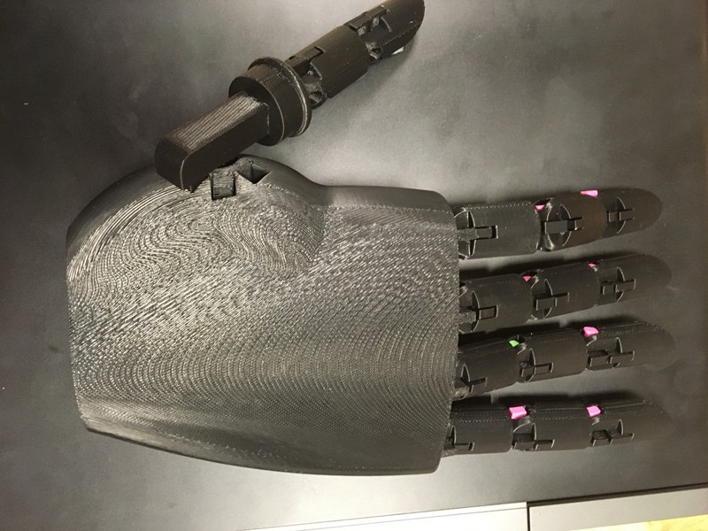 Engineering students develop 3-D-printed prosthetic hand for campus  employee
