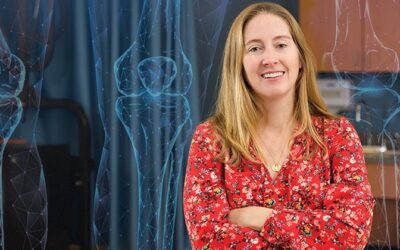 Higginson receives COE Teaching Award.